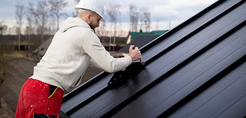 Tin Roof Ridge Cap Installation in Berwyn